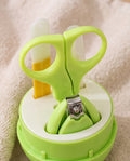 Premium 4-Piece Baby Nail Care Grooming Kit | Baby Nail Clipper, Safety Scissors, Tweezers & Nail File with Cute Green Travel Case